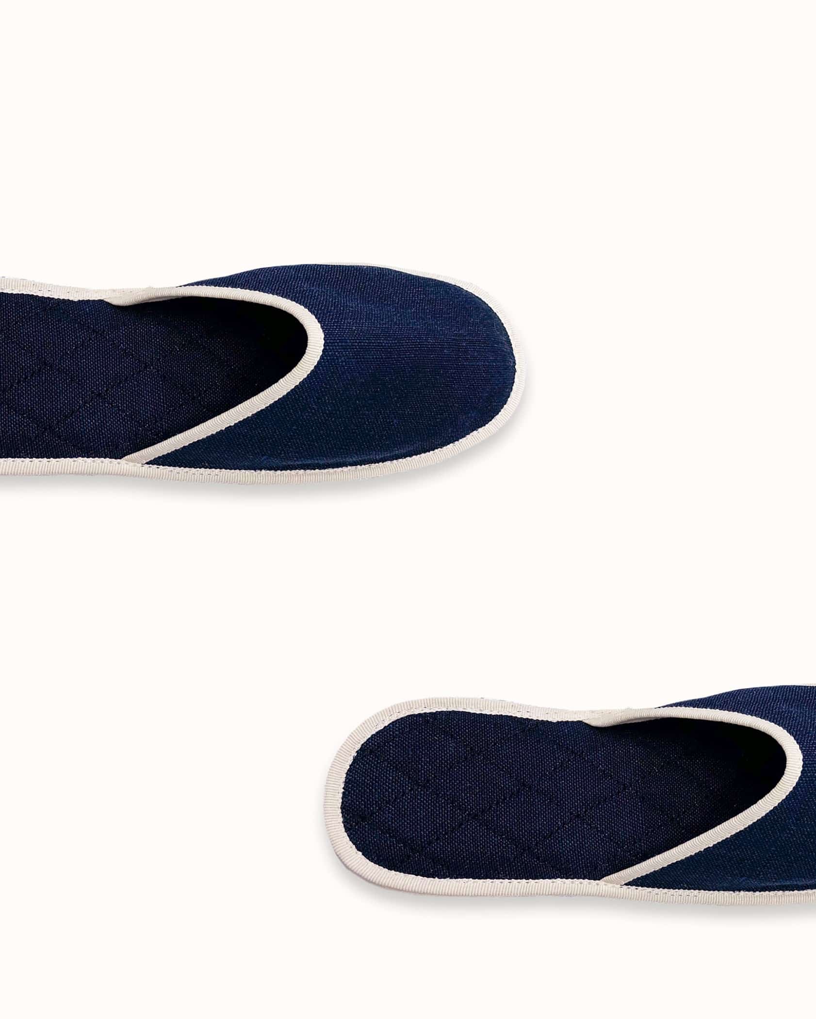 French slippers for men, women and kids. Le Spleen "Heure Exquise", navy blue and white. A slip-on like hotel slippers with a quilted padding and an outstanding craftsmanship manufacturing. Made in France.