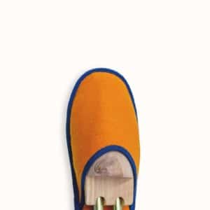 French slippers for men, women and kids. Le Spleen "Feu", orange and navy blue. A slip-on like hotel slippers with a quilted padding and an outstanding craftsmanship manufacturing. Made in France.